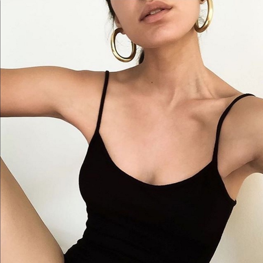 Laura Lombardi brass curve earrings